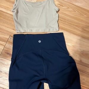 Lululemon Navy mid rise 7/8ths leggings. Size 4